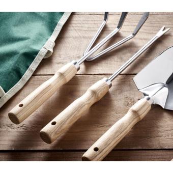 GREENHANDS Garden tools in apron Green